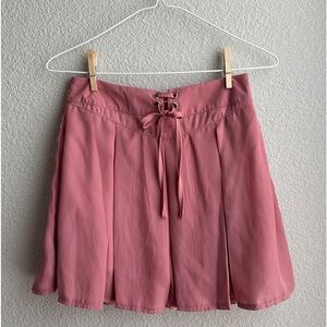 PINK PLEATED MINI SKORT